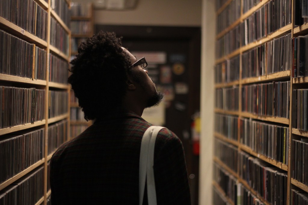 This is a photo of me by Katherine Spencer Carey at WPKN radio in Bridgeport, CT. I hosted an arts talk show for the station. 